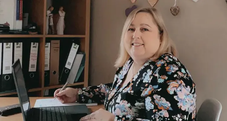 Mature student working at home desk